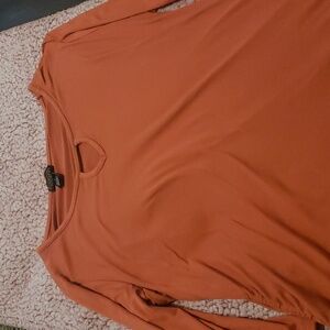 Long sleeve  color dark orange size is xl